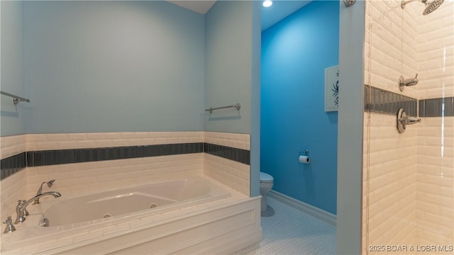 full bath with tile patterned flooring, baseboards, toilet, tiled shower, and a tub with jets