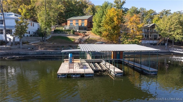 view of dock with a water view and boat lift