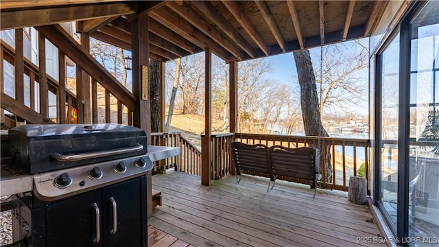 wooden terrace with grilling area