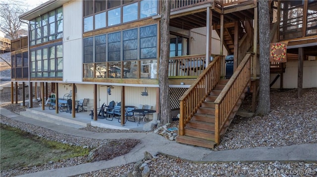 entrance to property featuring a patio area