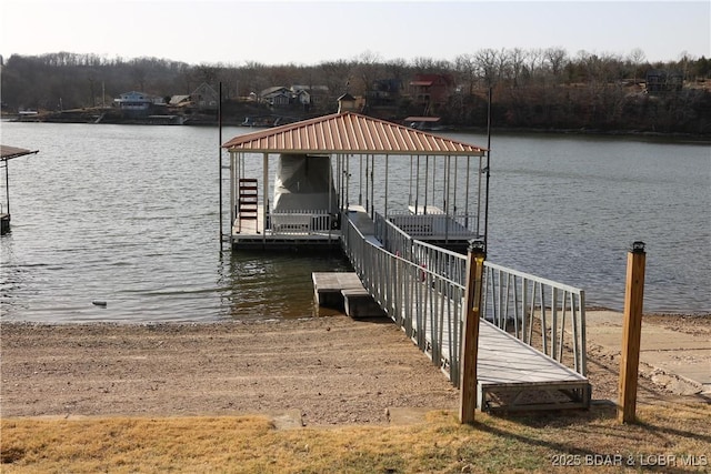 dock area with a water view