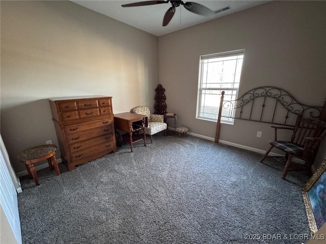 interior space featuring ceiling fan, carpet, visible vents, and baseboards