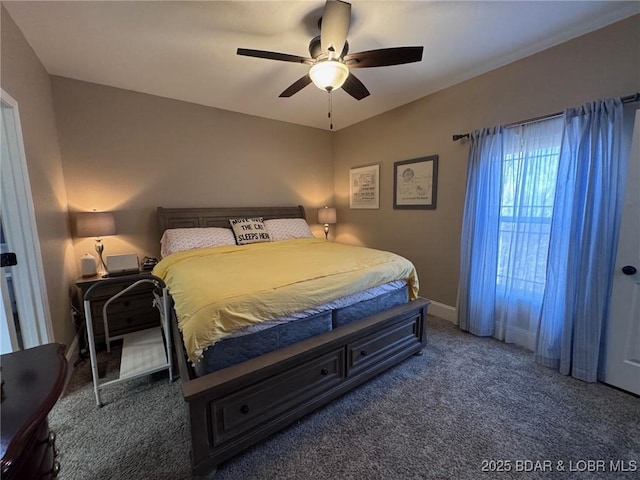 carpeted bedroom with baseboards and ceiling fan