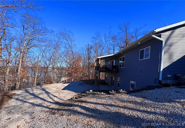 217 Highline Rd, Lake Ozark, MO 65049 - rear view of property with a wooden deck