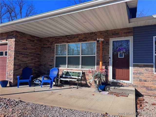 217 Highline Rd, Lake Ozark, MO 65049 - entrance to property with brick siding and a garage