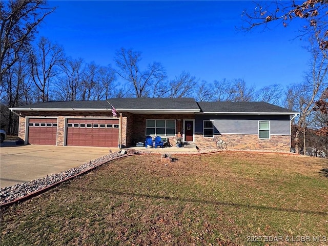 single story home with a front lawn, a garage, and driveway