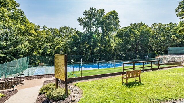 217 Highline Rd, Lake Ozark, MO 65049 - view of sport court with fence and a lawn