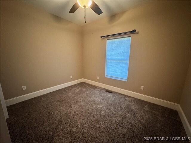 217 Highline Rd, Lake Ozark, MO 65049 - unfurnished room featuring a ceiling fan and dark colored carpet