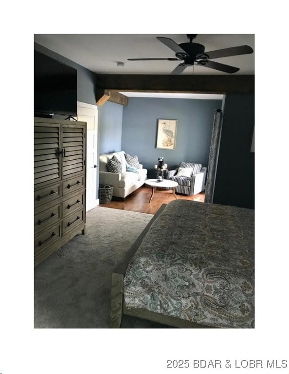 bedroom featuring ceiling fan and wood finished floors