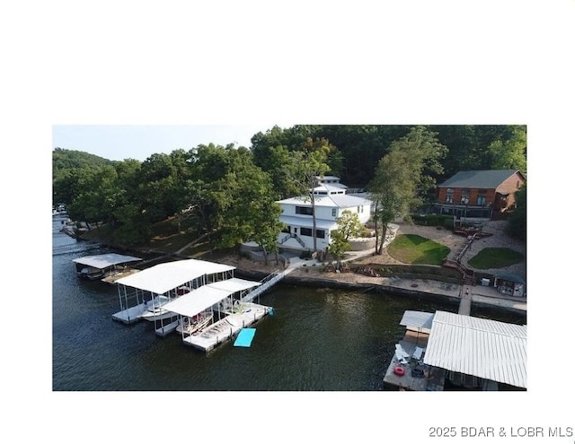 exterior space with a water view