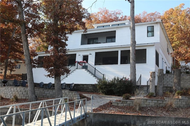 view of front facade with stairs