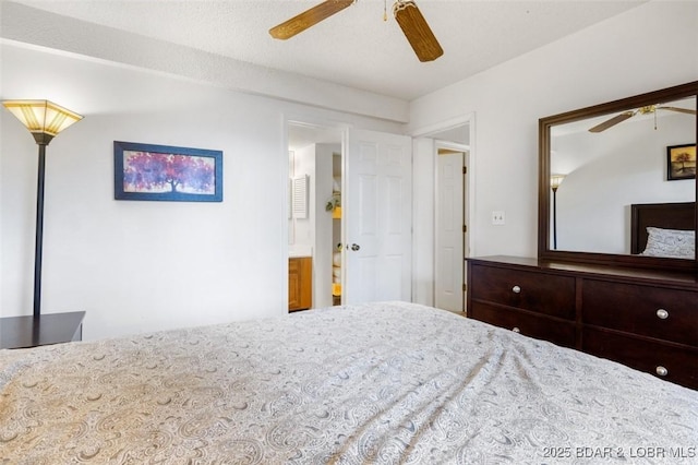 bedroom with a ceiling fan and connected bathroom