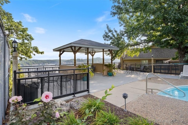 view of patio / terrace featuring a fenced in pool