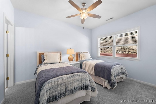 carpeted bedroom featuring visible vents, ceiling fan, and baseboards