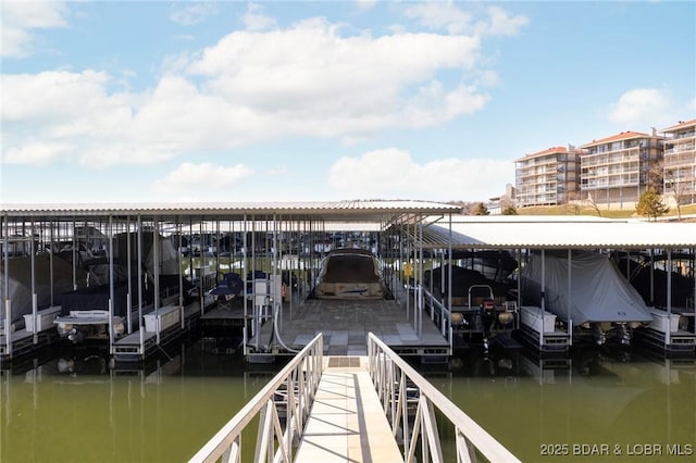 view of dock featuring a water view and boat lift