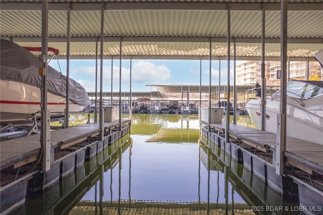 372 W Palisades Condo Dr Unit 4A, Lake Ozark, MO 65049 - view of dock with boat lift and a water view