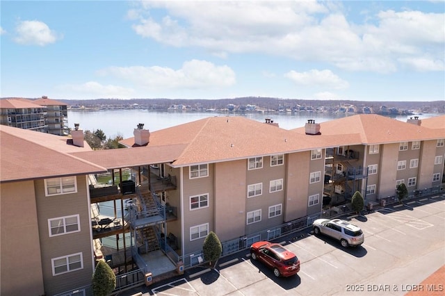 aerial view featuring a water view