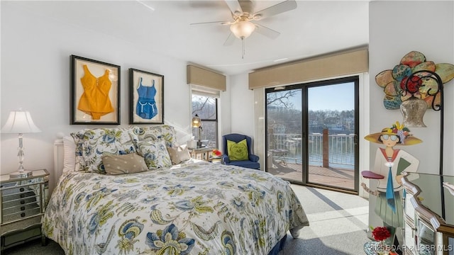 bedroom featuring access to outside, carpet, and ceiling fan