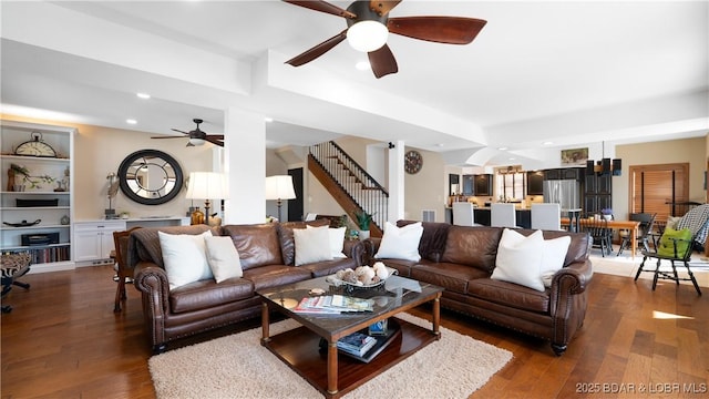 living room with recessed lighting, stairs, a ceiling fan, and dark wood-style flooring