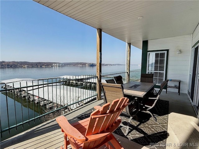 balcony featuring a water view