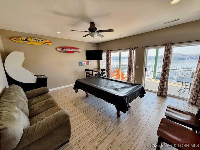 rec room featuring visible vents, pool table, baseboards, ceiling fan, and light wood-type flooring