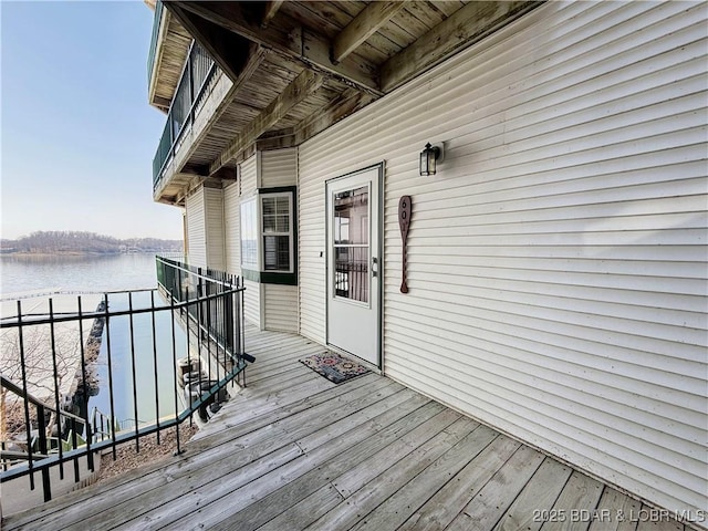 deck featuring a water view