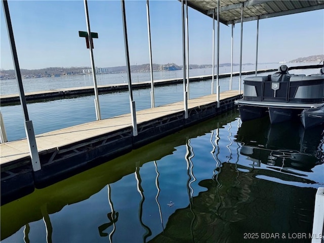 view of dock with a water view