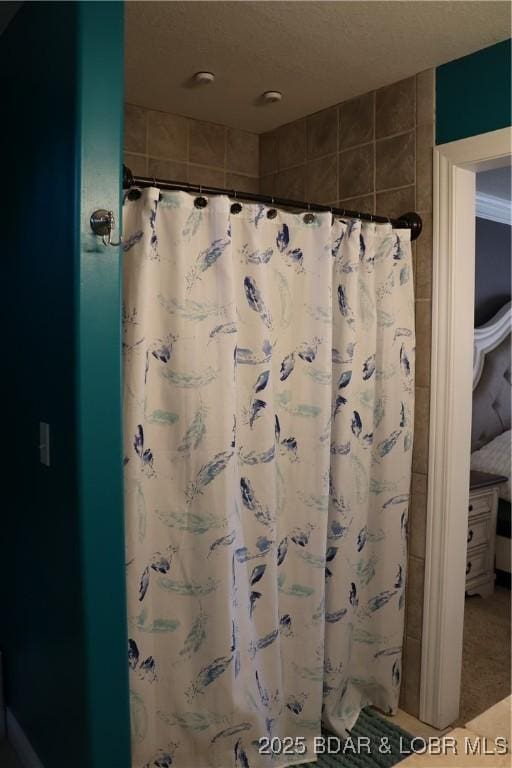 full bath with a shower with curtain