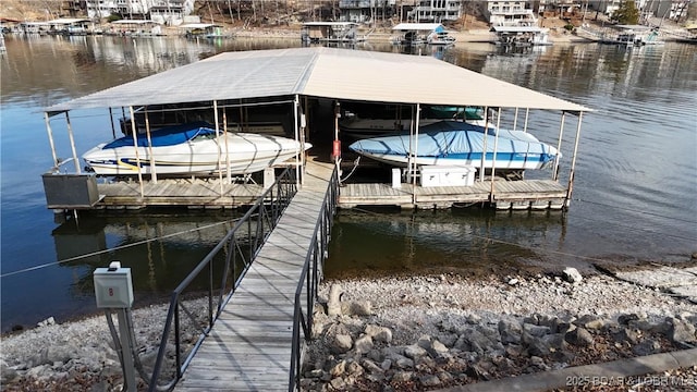 dock area featuring a water view and boat lift