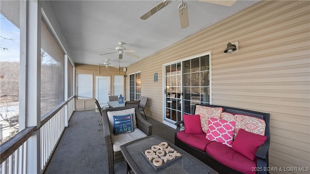 sunroom / solarium with ceiling fan