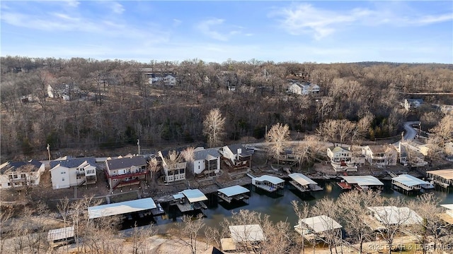 aerial view with a view of trees and a water view