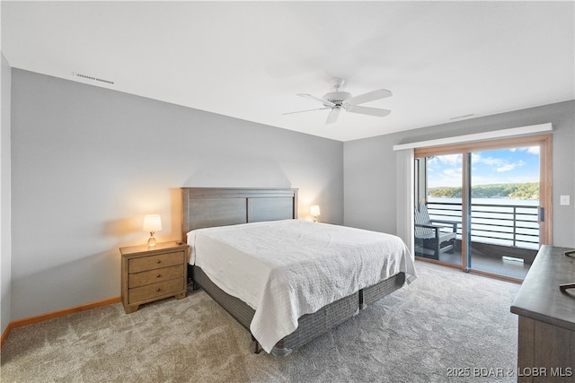 carpeted bedroom featuring a ceiling fan, access to exterior, baseboards, and visible vents