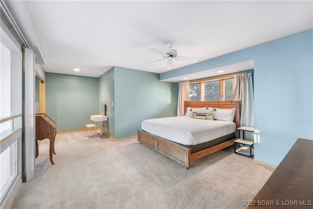 carpeted bedroom featuring recessed lighting, a ceiling fan, and baseboards