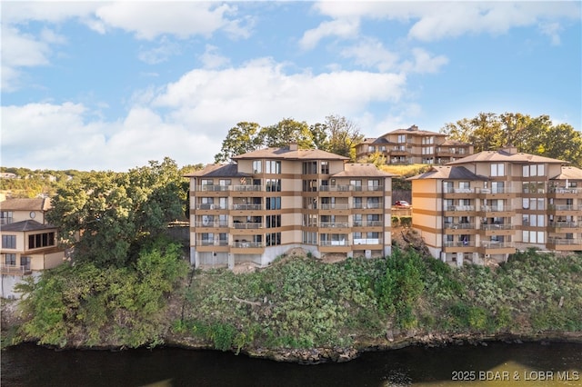 view of building exterior featuring a water view