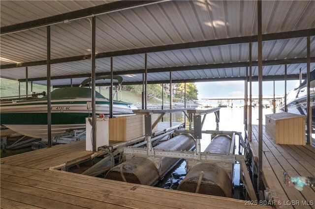 view of dock featuring boat lift