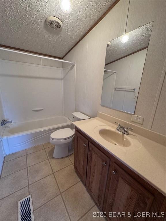 full bathroom featuring visible vents, a textured ceiling, vanity, and toilet