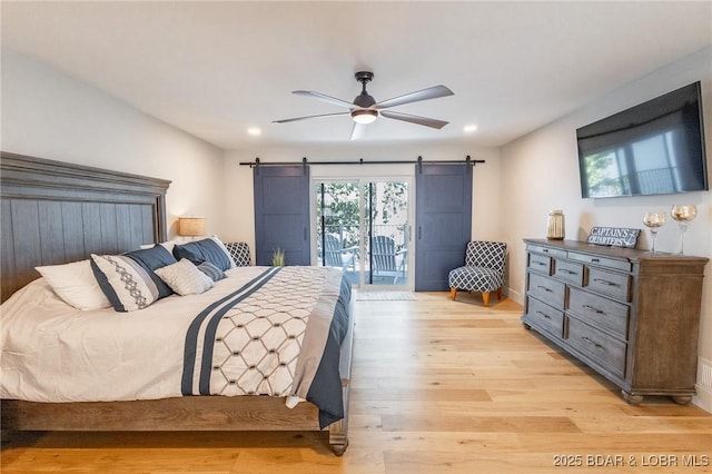 5885 Baydy Peak Rd, Osage Beach, MO 65065 - bedroom with a barn door, access to outside, light wood finished floors, recessed lighting, and ceiling fan