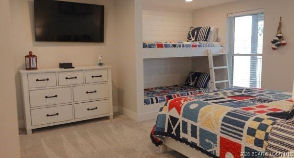 5885 Baydy Peak Rd, Osage Beach, MO 65065 - bedroom featuring light colored carpet and baseboards