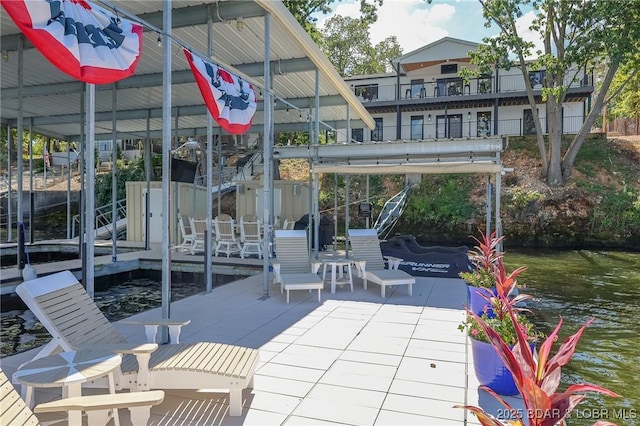 view of dock featuring a patio area