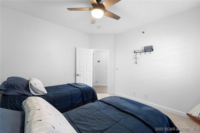 bedroom with carpet flooring, ceiling fan, and baseboards