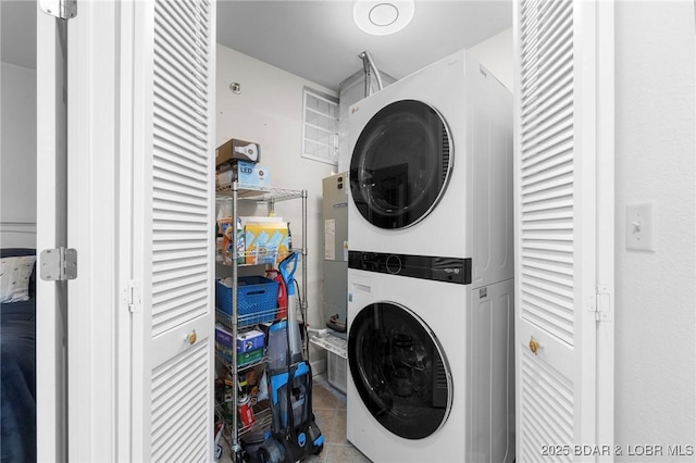 68 Lighthouse Rd Unit 344, Lake Ozark, MO 65049 - laundry room with estacked washer and dryer and tile patterned floors