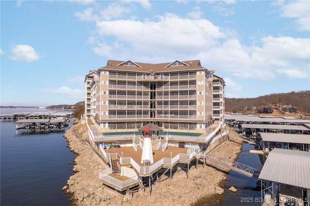 view of building exterior featuring a water view