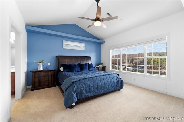 bedroom with light carpet, visible vents, a ceiling fan, and lofted ceiling