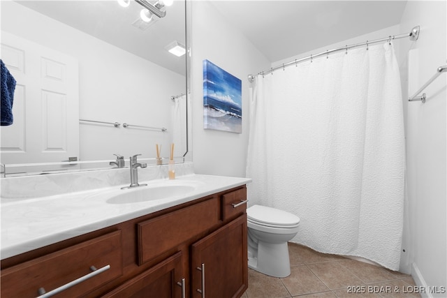 bathroom with tile patterned floors, toilet, and vanity