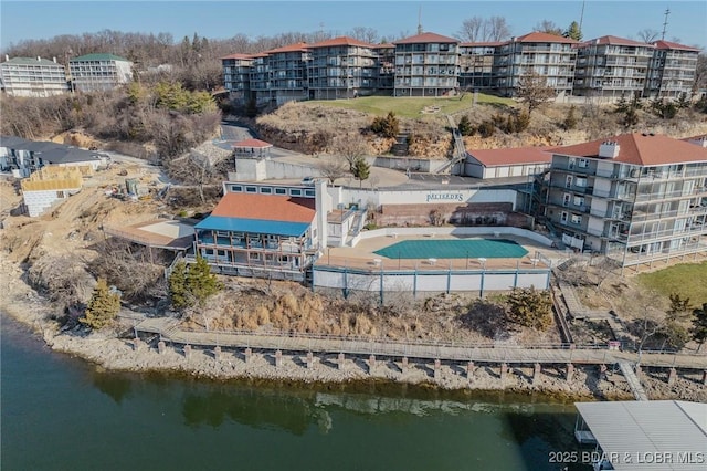 drone / aerial view with a water view