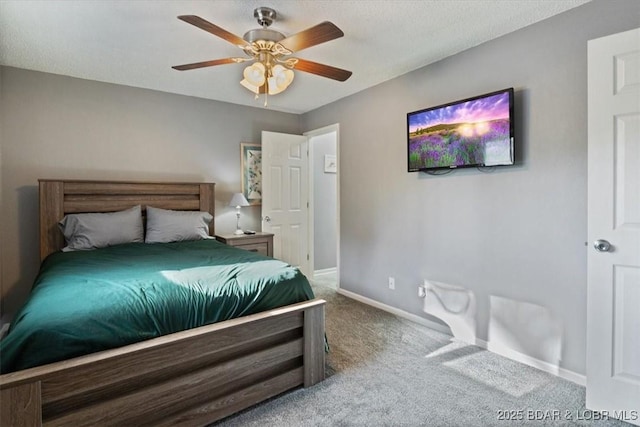 bedroom featuring a ceiling fan, baseboards, and carpet floors