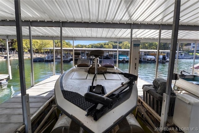 view of dock with a water view and boat lift