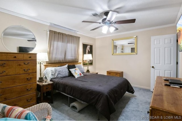 bedroom featuring crown molding, carpet flooring, a ceiling fan, and baseboards