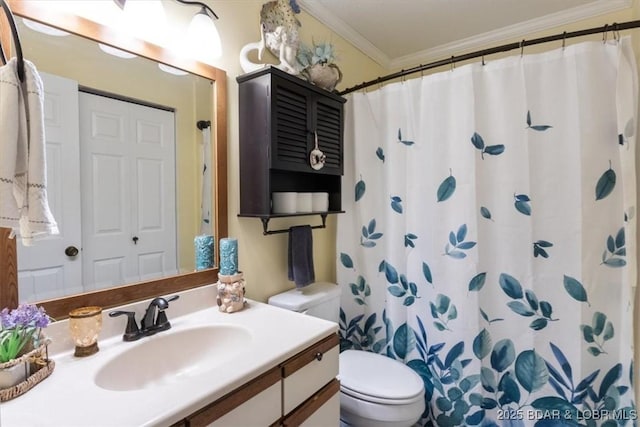 bathroom with curtained shower, toilet, ornamental molding, and vanity