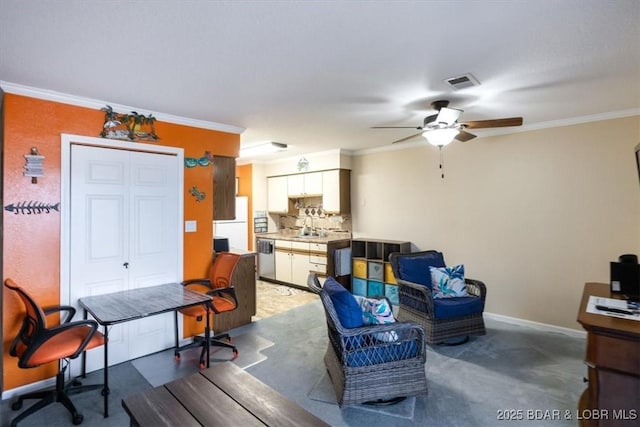 living room featuring ceiling fan, visible vents, baseboards, and ornamental molding